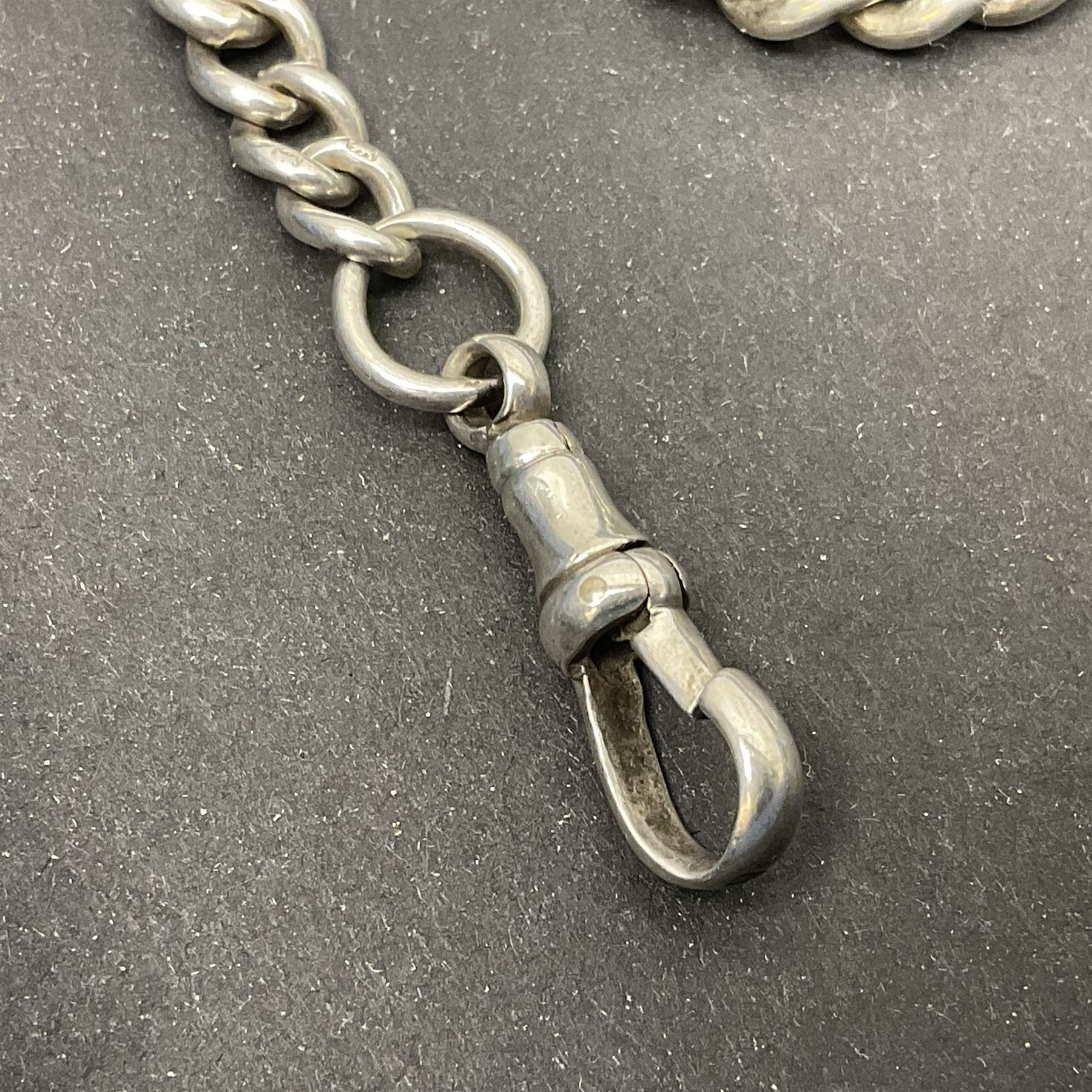 Early 20th century silver tapering Albert chain, hallmarked to T bar and clips, with lion passant stamped on each link