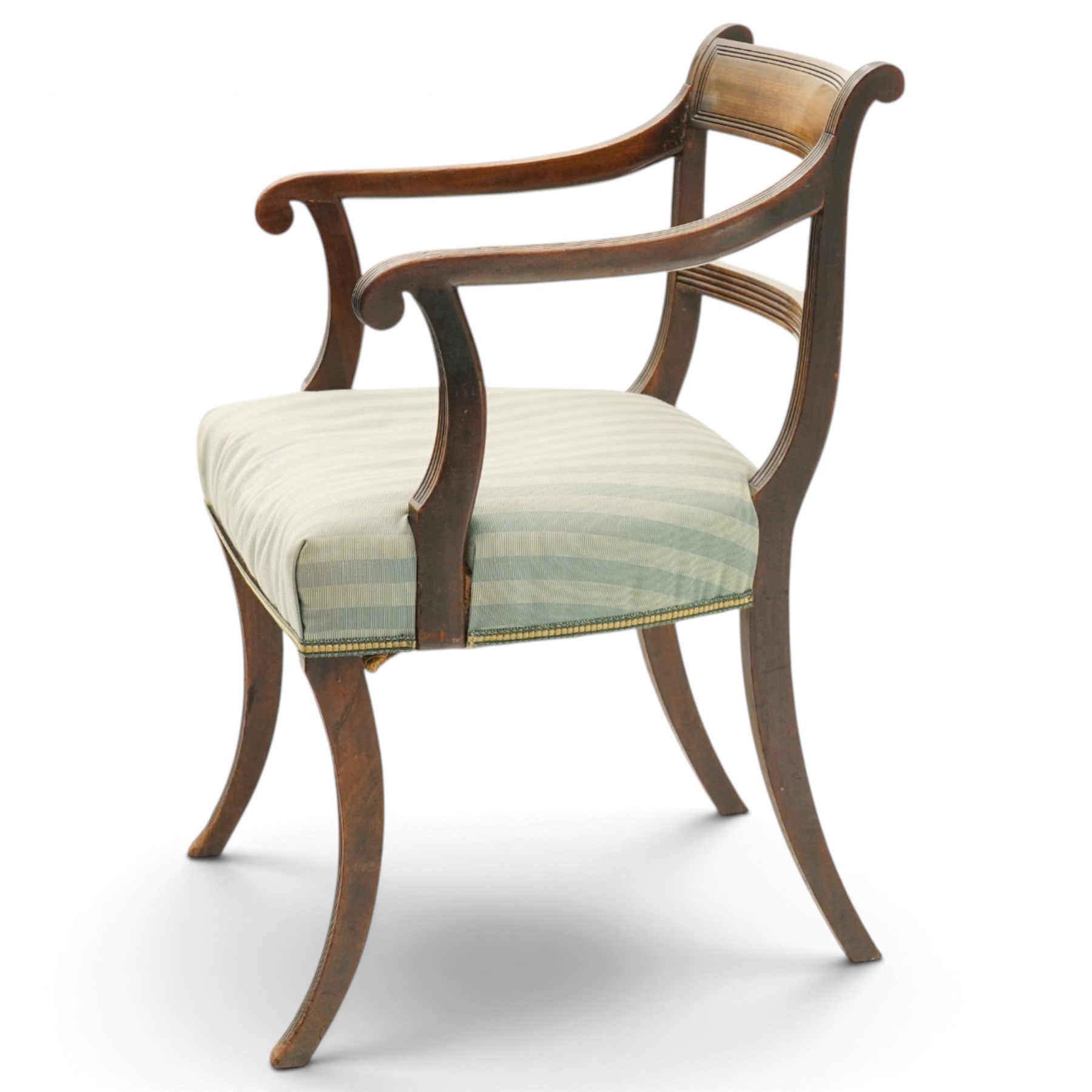 Georgian mahogany reeded carver armchair or elbow chair, bar back and scrolled arm terminals above over-stuffed seat, raised on sabre supports