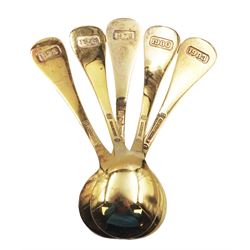 Five Danish silver-gilt year spoons by Georg Jensen, each decorated with different floral motif including sunflower, forget-me-not and shamrock, dated between 1973 and 1983, each impressed on underside RA AB, Sterling Denmark, and marked for Georg Jensen, approximate gross weight 7.3ozt (227 grams)