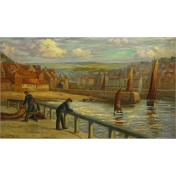 Charles E Flowerdew (British exh.1885): Whitby Fishermen on the East Pier, oil on canvas signed and dated 1903, 49cm x 83cm
