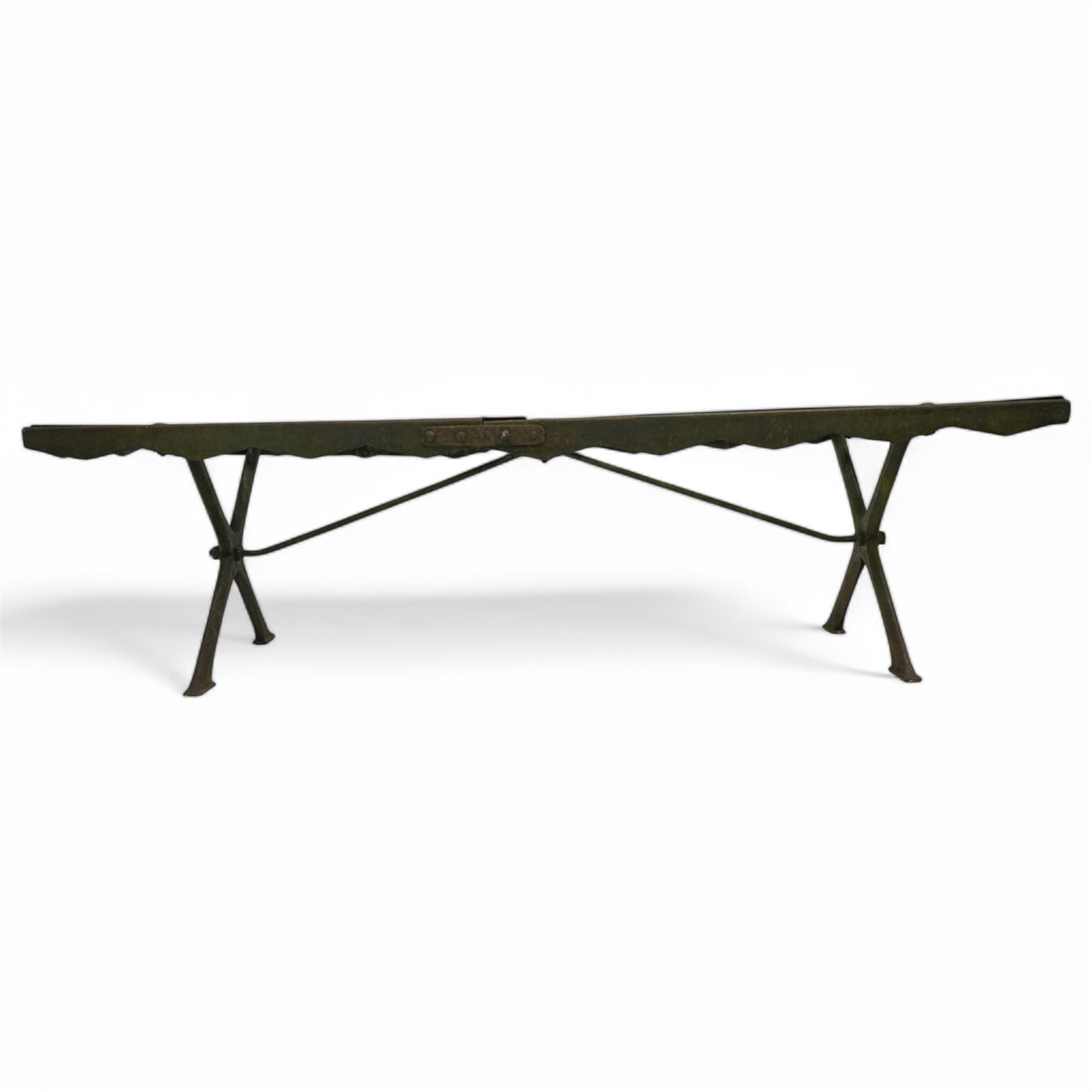 Two cast iron garden benches, rectangular seat with lozenge grate panels, on X-framed supports 