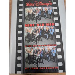 Collection of Disney animation and drawing books, including Walt Disney's Nine Old Men flipbooks, three Nine Old Men reference books, Marc Davis Walt Disney's Renaissance Man, A Disney Sketchbook and The Illusion of Life (7)