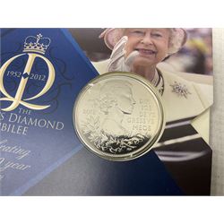 Coins and sets, including Great Britain and Northern Ireland 1970 proof coin collection in card folder, Queen Elizabeth II 2021 'Through the Looking Glass' five pounds, 2021 'Winnie the Pooh' fifty pence, Queen Victoria 1887 halfcrown, King George V 1914 halfcrown, commemorative coins, The Royal Mint Solomon Islands 2003 twenty-five dollars silver proof coin cased with certificate, 9ct gold half sovereign mount etc