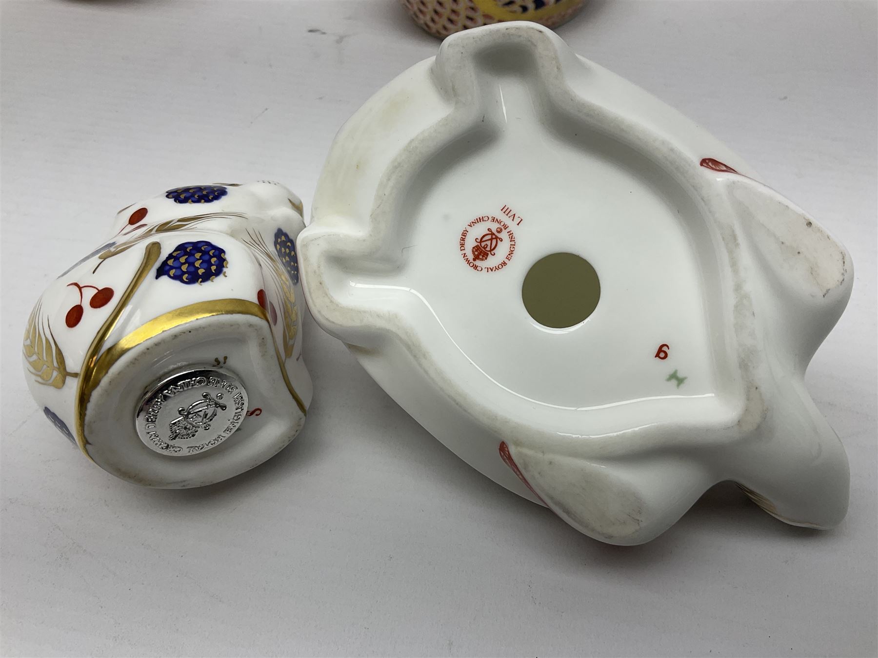 Seven Royal Crown Derby Paperweights, to include Field mouse with silver stopper, Dormouse, Chicken etc,  six without stoppers   