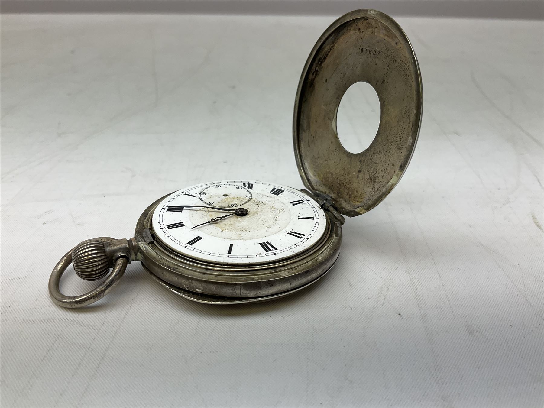 Miniature all nickel 2mm pin fire single shot pistol with engraved grip L4.5cm; together with a .925 silver half hunting cased keyless wind pocket watch inscribed 'Presented to Pte. P. Sizer By No.2 Company 1st Battalion Lincolnshire Regmt For Gallant Conduct Nr. Cork (Ireland) 31.7.20' (2)