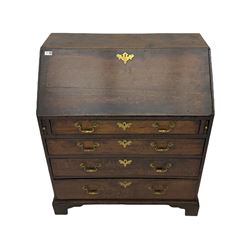 Georgian oak bureau, fall front enclosing fitted interior, four long graduating drawers, on bracket feet