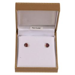 Pair of 9ct gold oval garnet stud earrings, boxed, H6mm