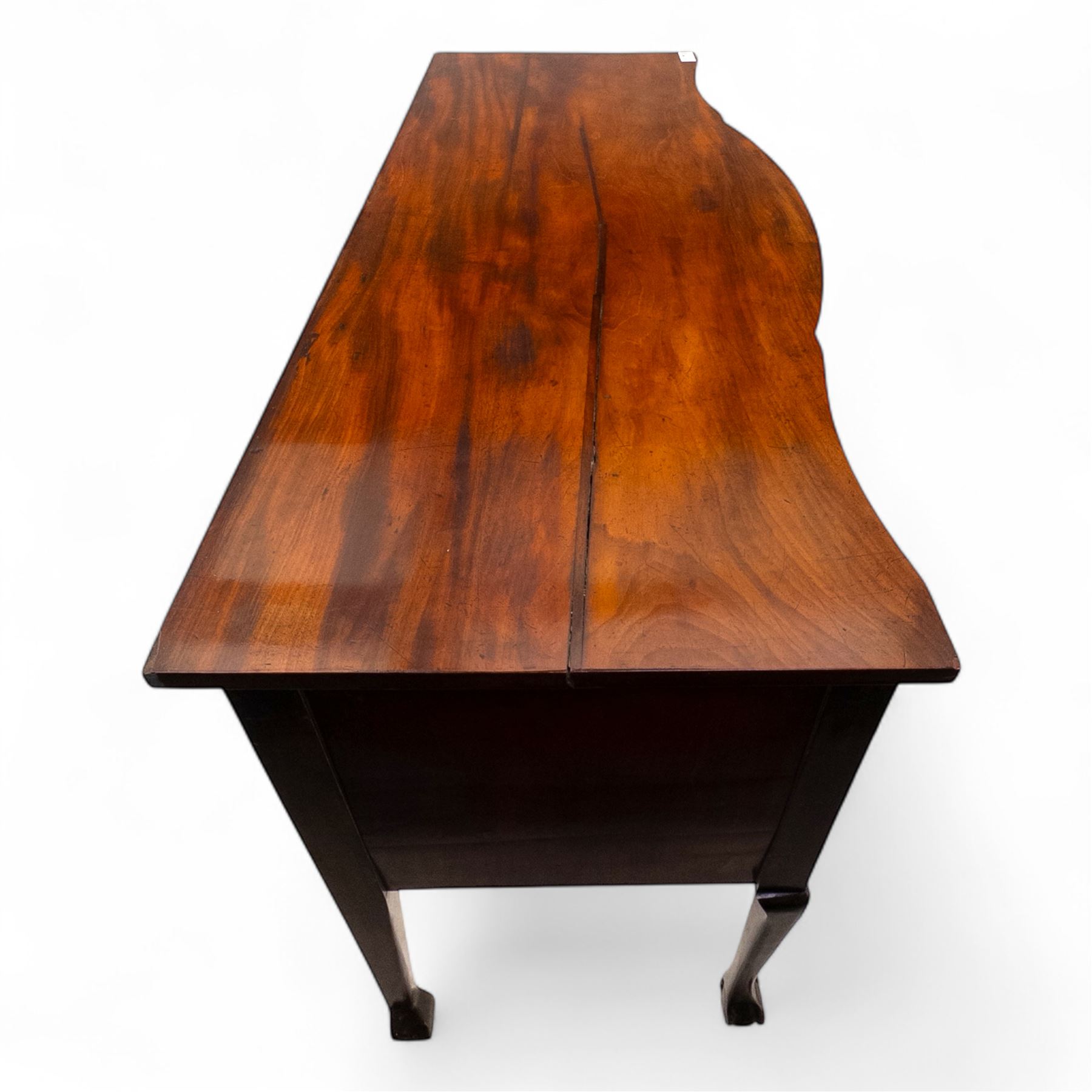Late 19th-century mahogany bowfront sideboard, fitted with a central frieze drawer above a reeded apron drawer flanked by two deep cupboards, raised on cabriole legs with ball and claw feet