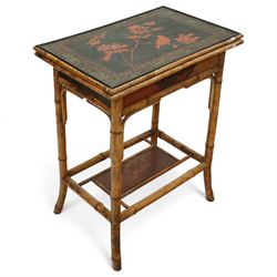 Late Victorian bamboo and lacquered card table, the top decorated with birds and floral sprays, hinged to reveal a baize playing surface, on bamboo effect legs with lacquered undertier