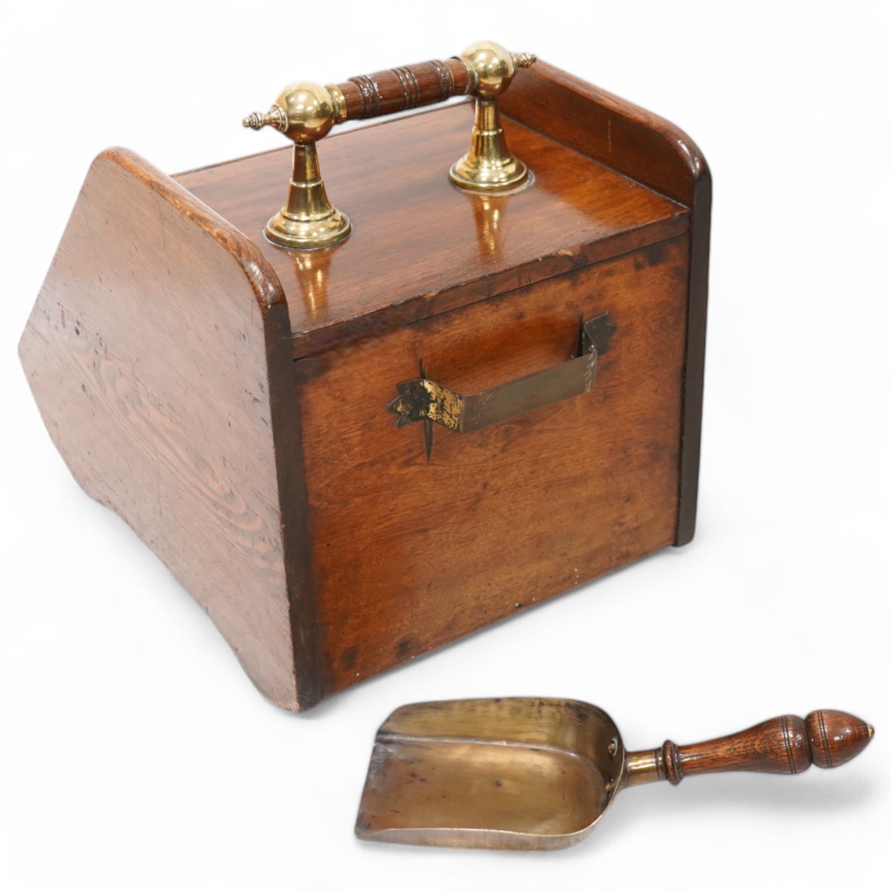 Late Victorian oak coal box, with brass mounted decoration, the hinged lid lifting to reveal removable interior lining, with scoop