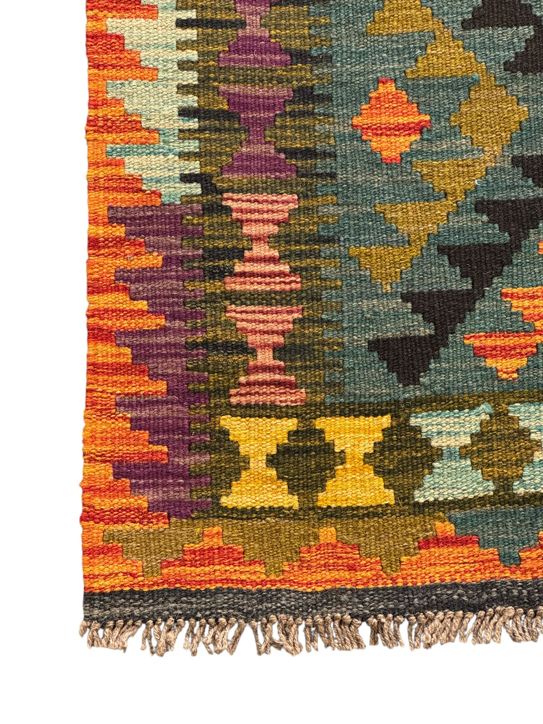 Afghan Maimana Kilim flatweave rug, teal ground with a vibrant multicoloured diamond lattice, framed by stylised border motifs and finished with fringed edges