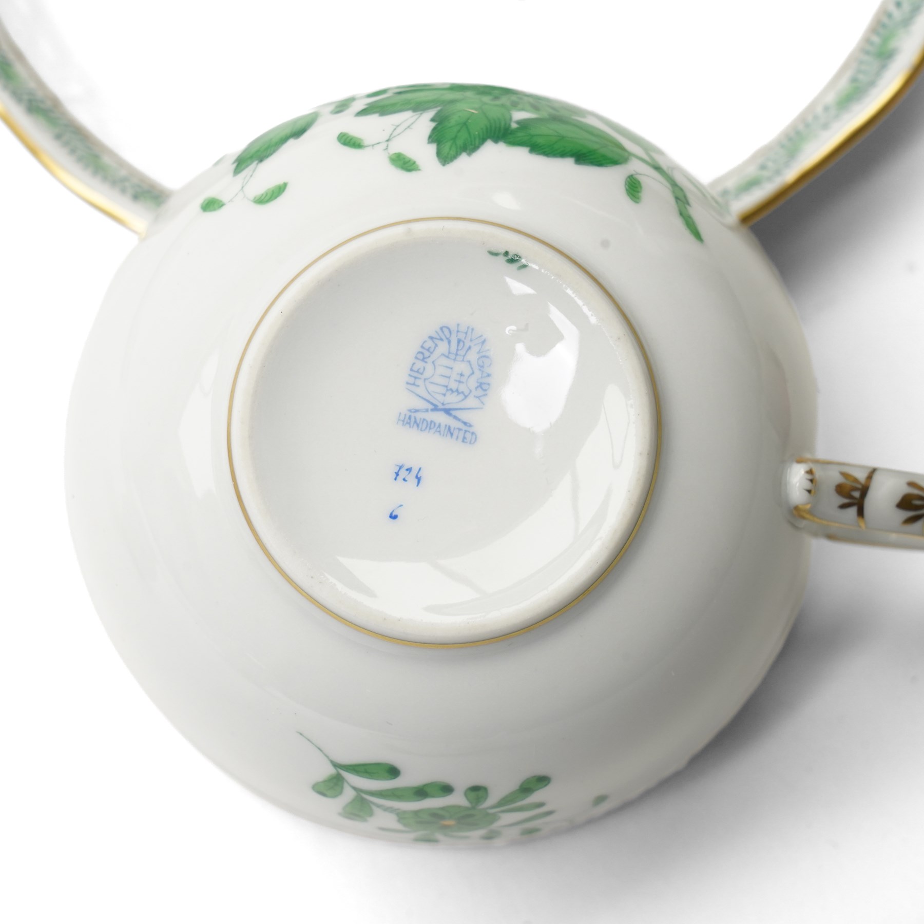 Herend porcelain Tete a Tete decorated in the green Chinese Bouquet pattern, comprising cabaret tray, two cups and saucers, tea pot, leaf shape bowl and milk jug