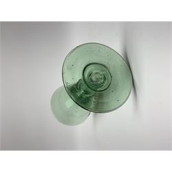 19th century bohemian green glass wine glass, the funnel bowl decorated in enamells with a Historismus hunting scene in the manner of Egermann & Lobmeyr, upon a baluster stem and circular foot, H14.5cm