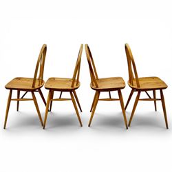 Ercol - set of four elm 'Windsor' chairs, hoop design back dish seat, tapering supports united by H-stretcher 