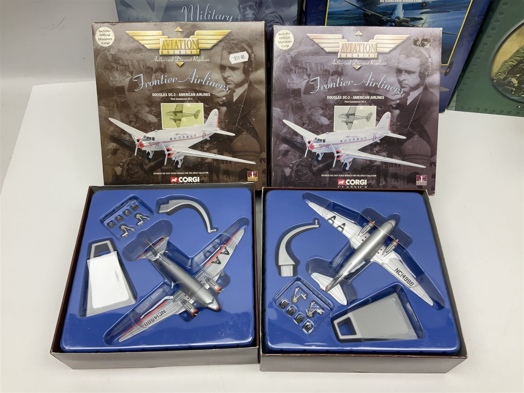 Fifteen modern die-cast models of aircraft by Corgi, Atlas Editions and Ixo including Aviation Archive, War Birds, Fighters of WWII etc; and model of an MGB Sports Car; all boxed (16)
