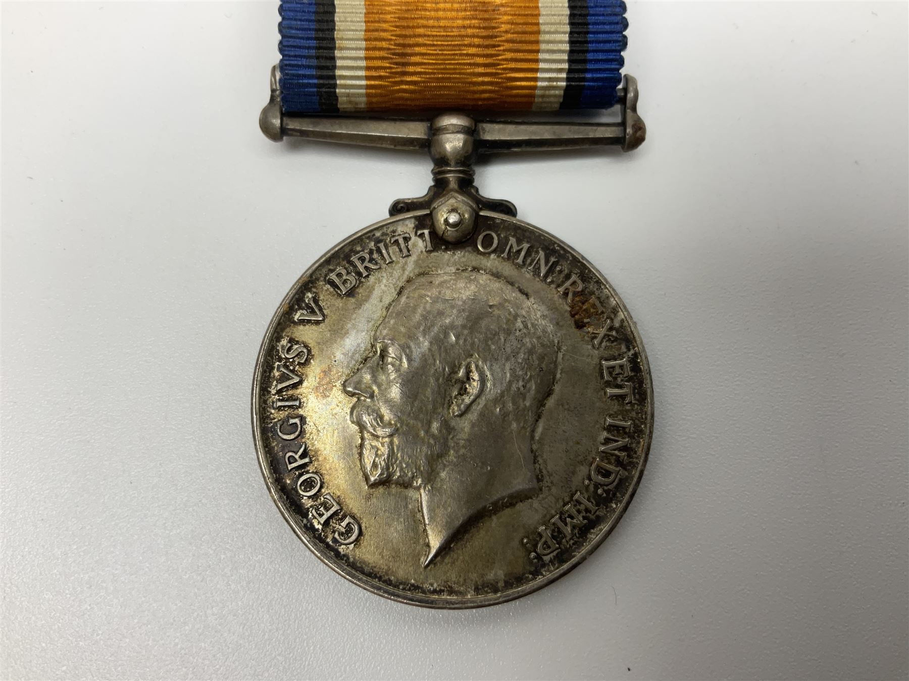 WW1 group of three medals comprising British War Medal, Victory Medal and 1914-15 Star awarded to 90434 Gnr. R.G. Rhodes R.F.A./R.A.; all with ribbons