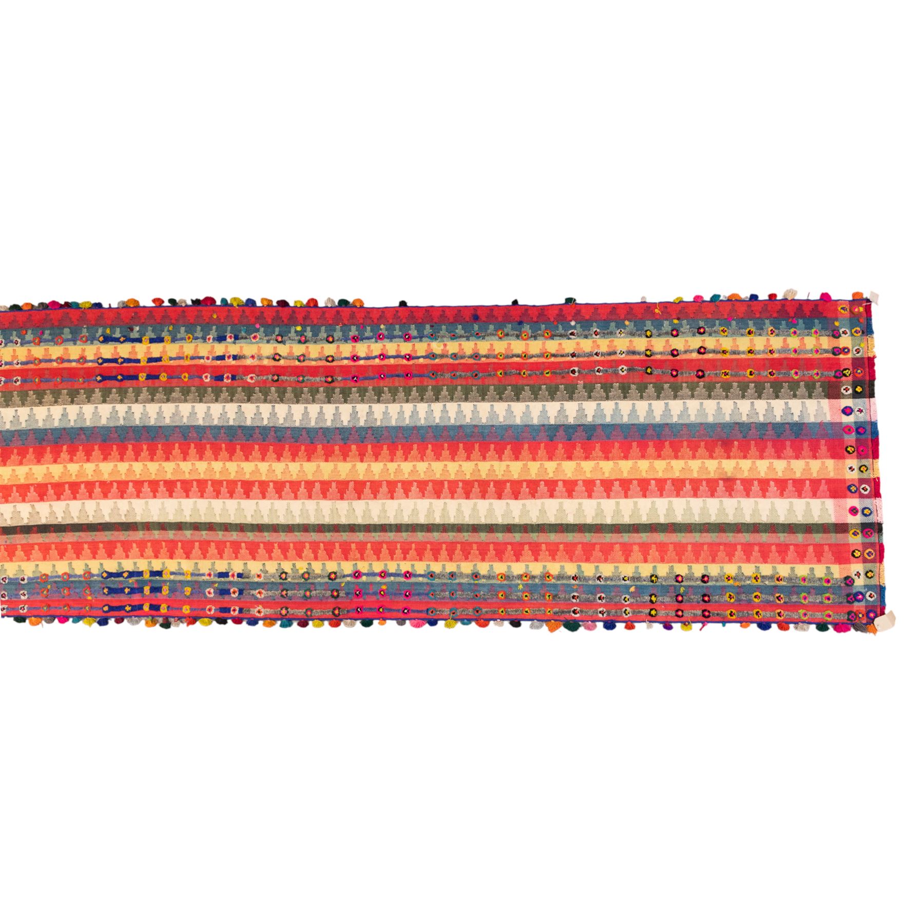 South West Persian Jajim kilim flatweave runner, woven in warp-faced flatweave and composed of narrow bands, striped field in various shades of rose, coral, ivory, indigo, turquoise, and olive, embellished along the sides with applied knotted wool rosettes and tassels, some missing (due to large size, the runner is illustrated in two sections)