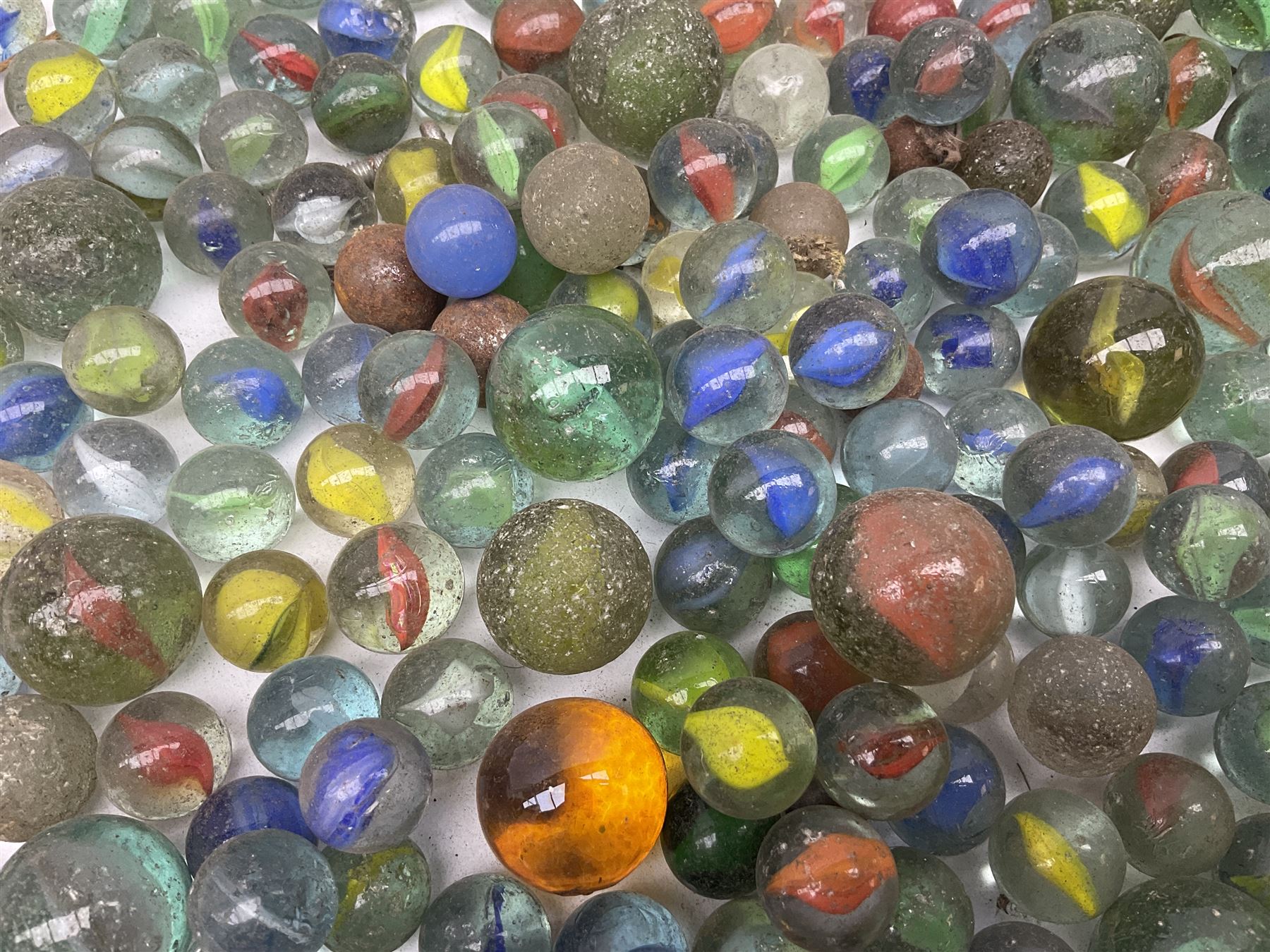 Collection of marbles with multi-coloured latticino or onionskin decoration