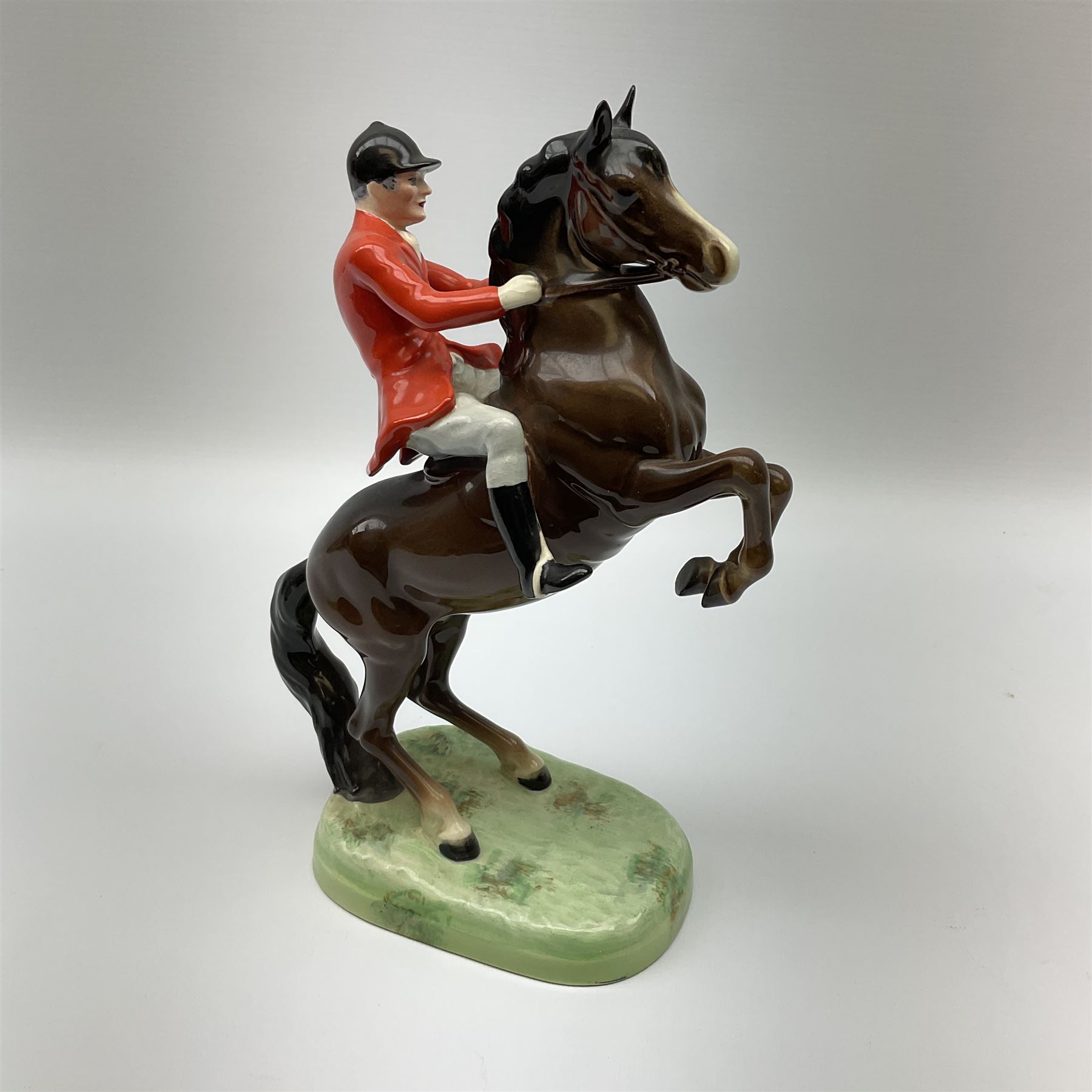 A Beswick model of a huntsman on rearing horse, model no 868 2nd edition, with printed mark beneath, H25cm. 