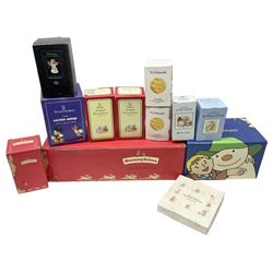 Royal Doulton The Mickey Mouse Collection Pluto figure, Coalport Characters The Snowman Dressing Up figure, three Royal Doulton Bunnykins figures comprising Policeman, Morris Danger and Eskimo, and display stand, Royal Doulton John Beswick Tiggy Winkle, Royal Albert Beatrix Potter Peter Postbag and three Goebel Hummel figures, all boxed