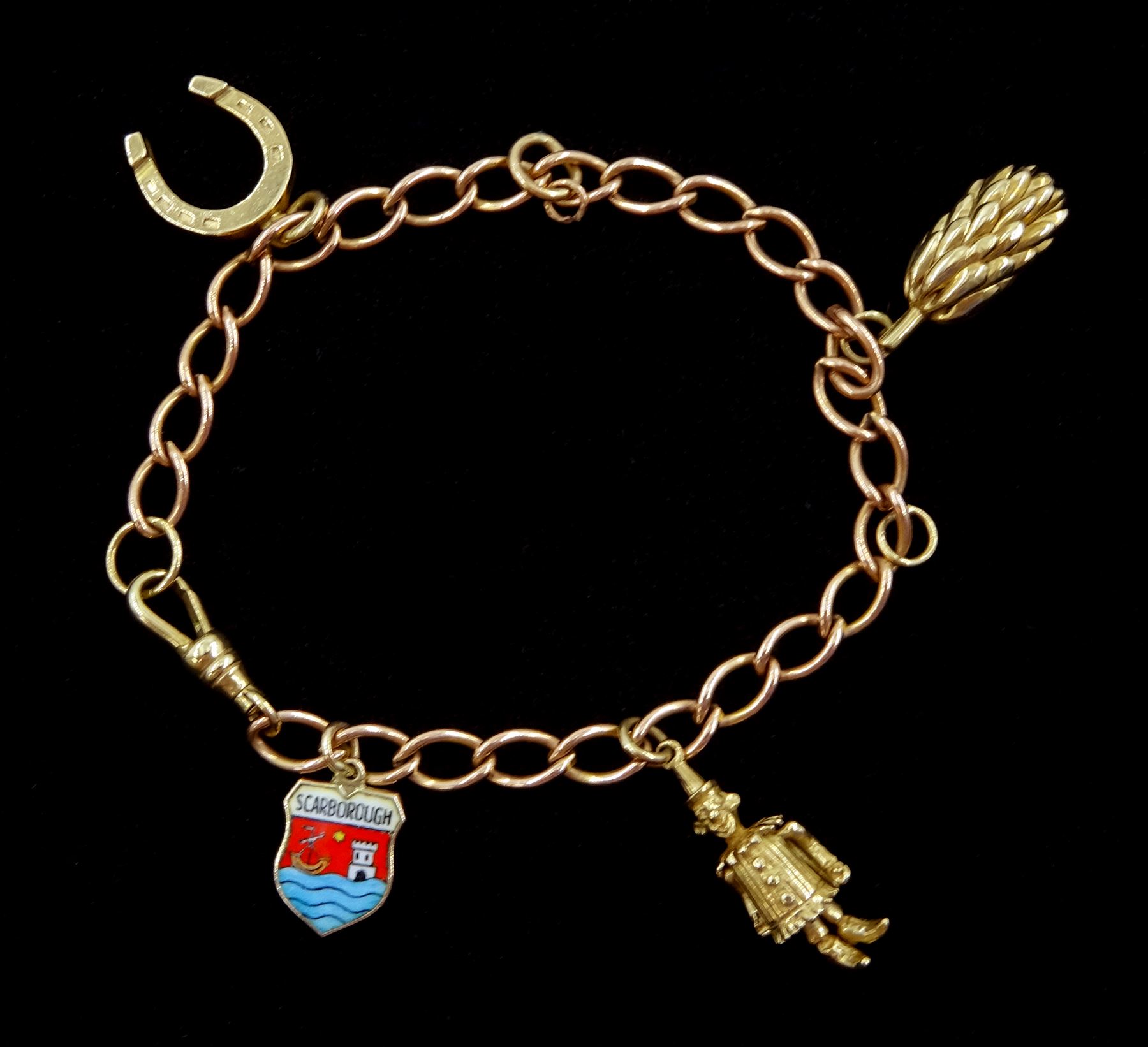 9ct rose gold curb link charm bracelet with yellow gold clip and four 9ct gold charms including, horseshoe, clown, bananas and enamel Scarborough charm