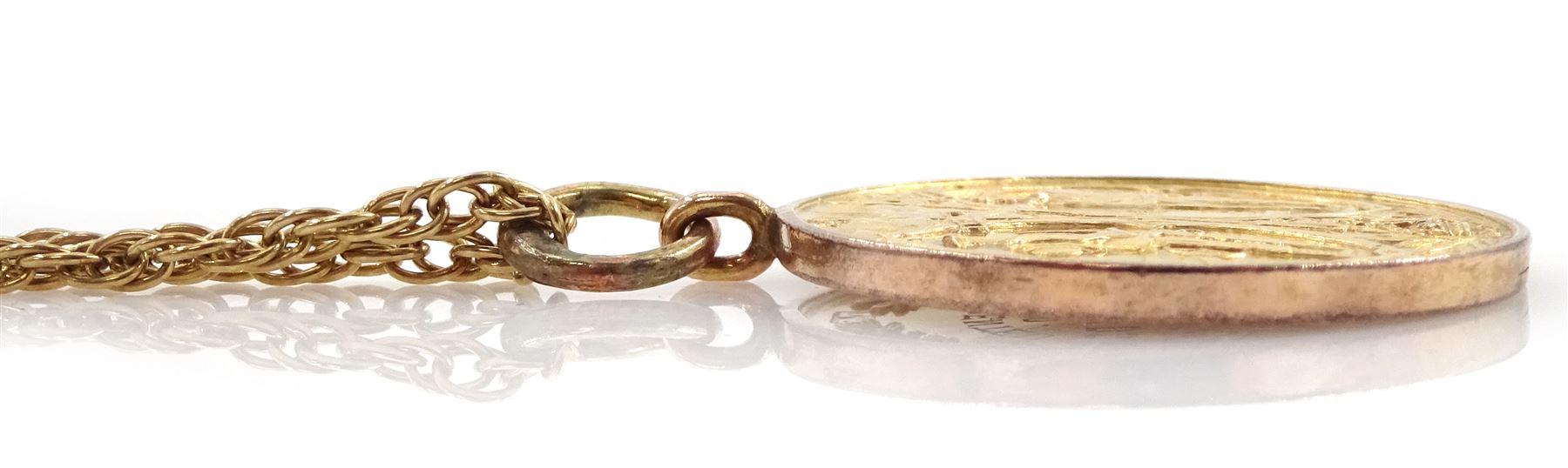 9ct gold medallion pendant depicting WW1 soldier and sailor by Thomas Fattorini, Birmingham 1919, engraved 'Presented to G.W.Childs from The H.H.W.C.' verso, on 9ct gold necklace chain