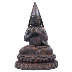 20th century bronzed Tibetan figure Tsongkhapa, seated upon a double lotus leaf, H30cm