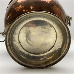 Copper pedestal punch bowl, with planished decoration with twin lion mask and ring handles and applied coins, H18cm