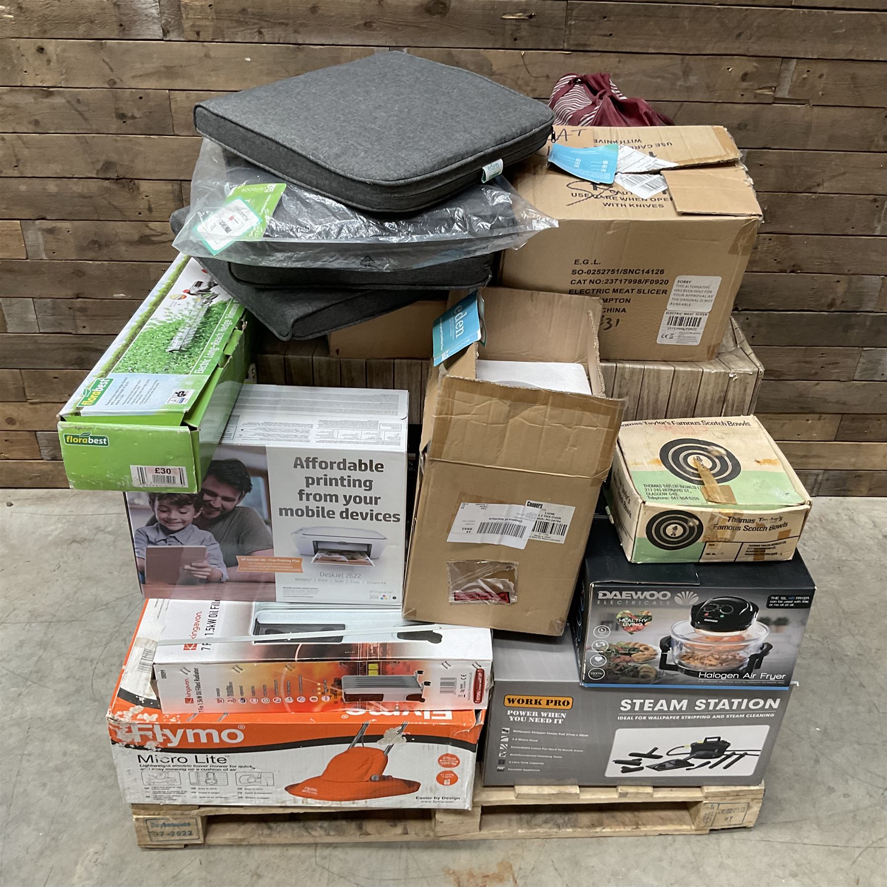 Collection of boxed items including a Flymo Micro Lite lawn mower, HP printer, Daewoo Halogen Air Fryer, an oil filled radiator etc