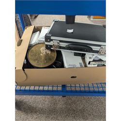Collection of projectors, including Transpaque Junior overhead projector, Demo Comm 1 overhead projector, Bolex 18-9 Duo, Bolex 18-5, Pathescope Kid, Kodascope Model C, collection of video tapes and film reels, empty projector box, Kinay 816 editor, etc