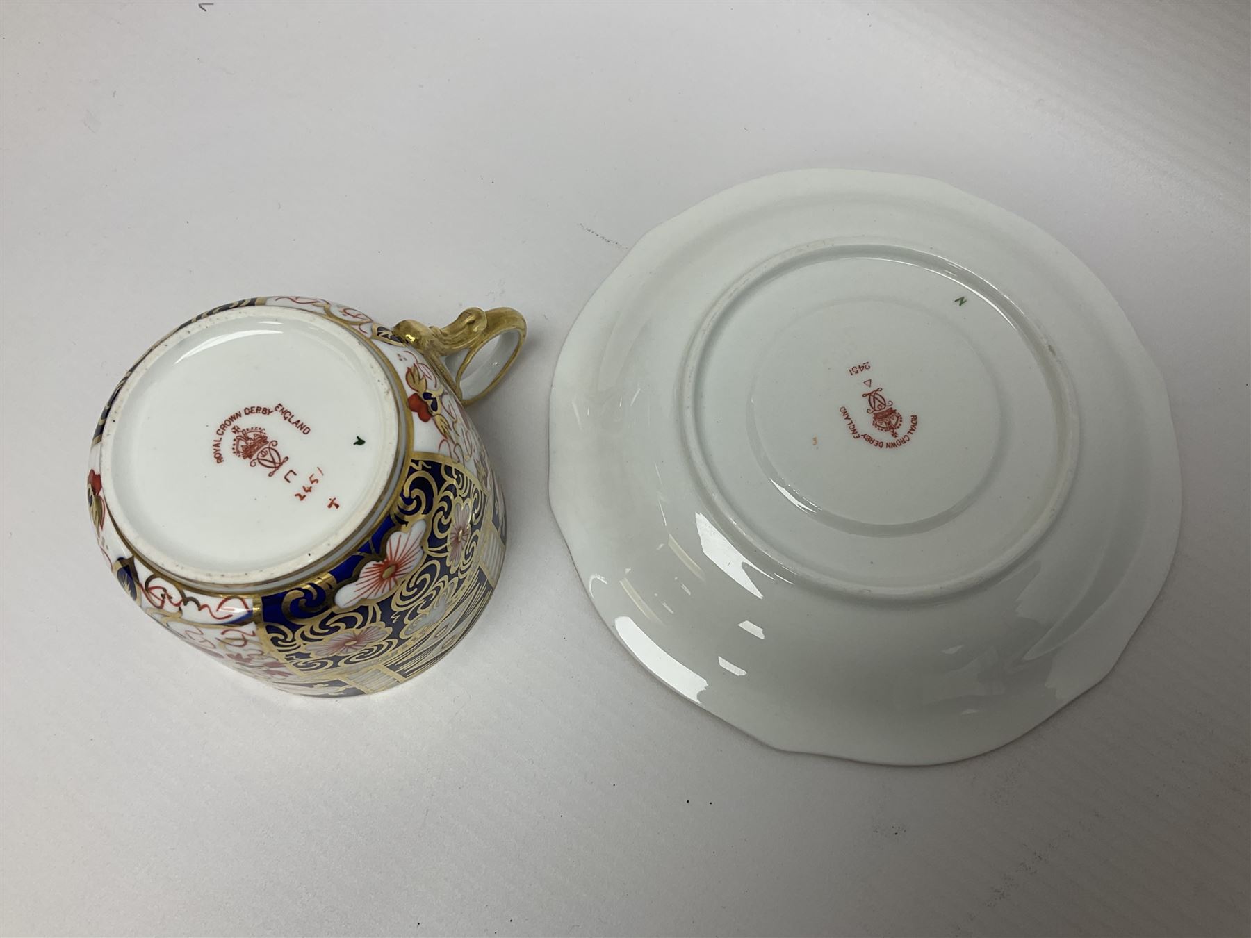 Six Royal Crown Derby cups and saucers all in imari pattern 2451, in various shapes  