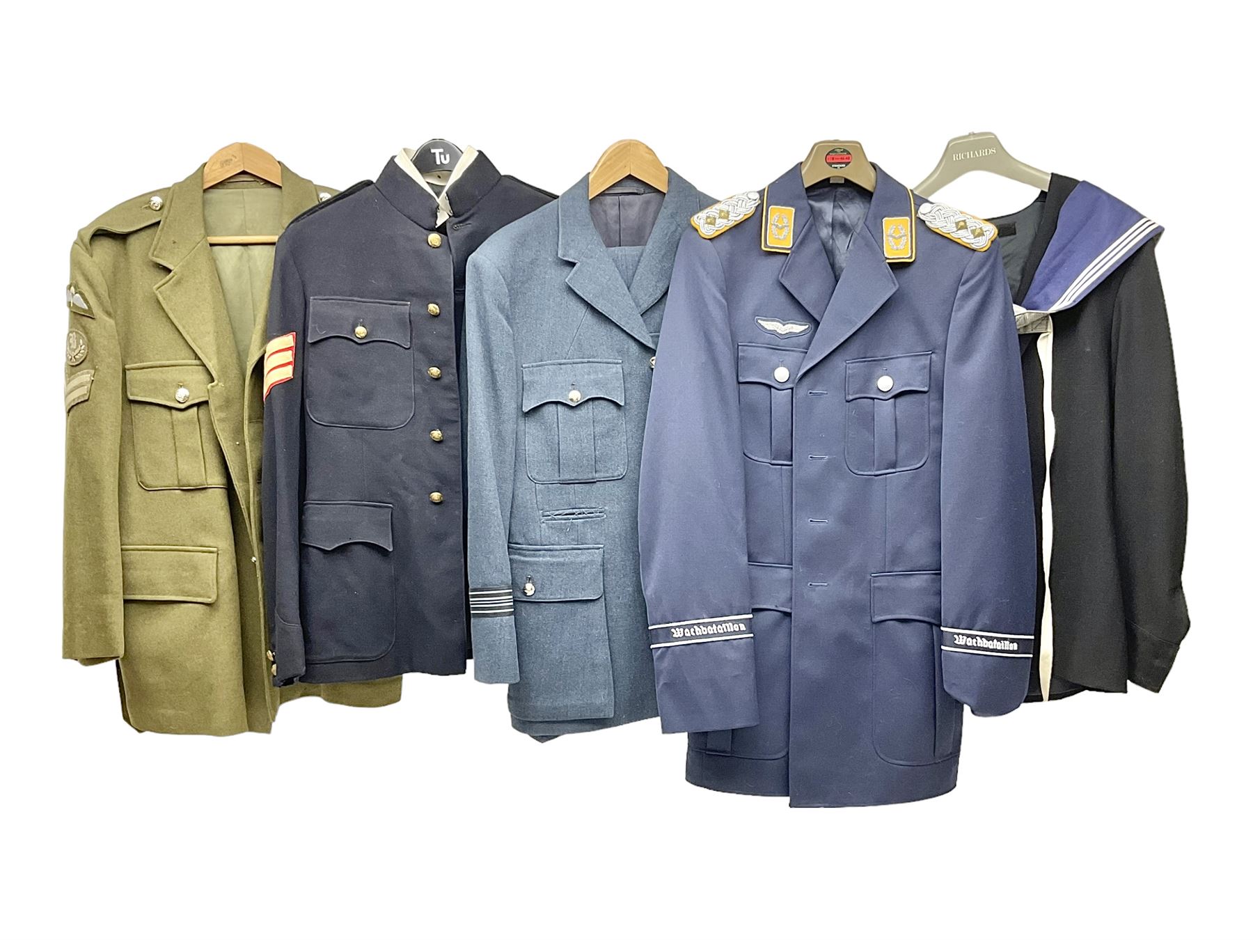 Five military uniforms comprising German Wachbataillon tunic, RASC No.2 dress tunic dated 1963, RAF tunic and trousers dated 1974, RE No.1 tunic and RN Seamans jumper Class II (5)