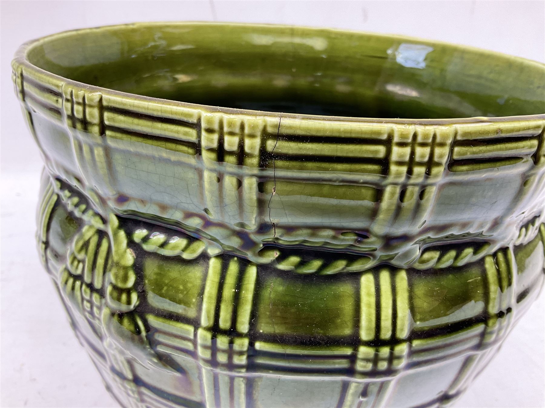 Three jardinières comprising West German Gerz example decorated in relief, Doulton Slaters example with frilled everted rim and a majolica example, and a further two Arthur Wood majolica jugs (5)