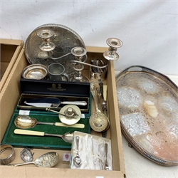 A group of assorted metal ware, comprising largely silver plate, to include two trays with foliate detail and pierced sides, berry spoon, teaspoons, cased cake knife, and other cased servers, tankards, wine label, etc., plus a silver handled knife, hallmarked Harrison Brothers, Sheffield 1993. 