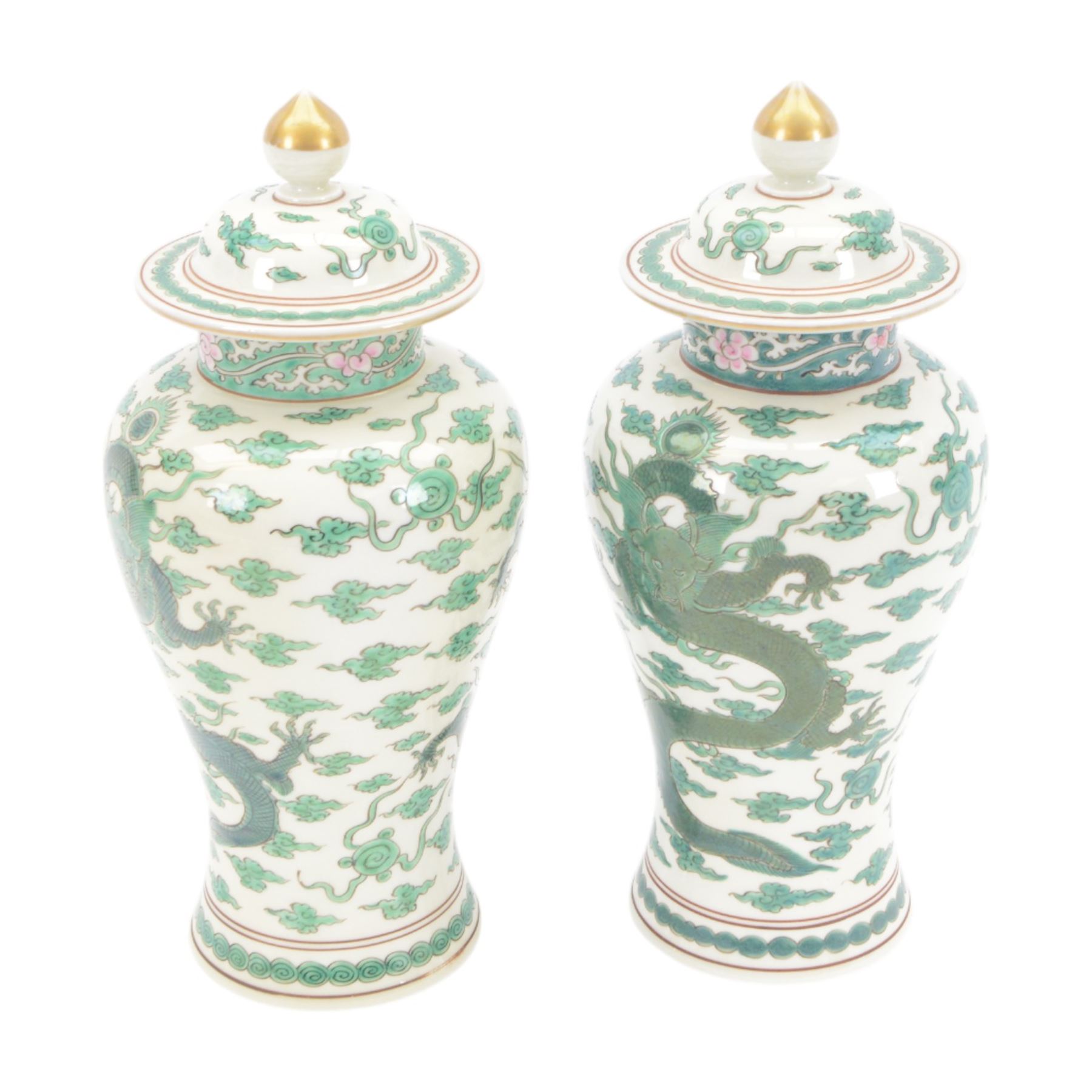 Pair of Chinese famille verte vases and covers, each of baluster form, decorated with dragons and flaming pearls amidst auspicious clouds, with mark beneath, H31cm