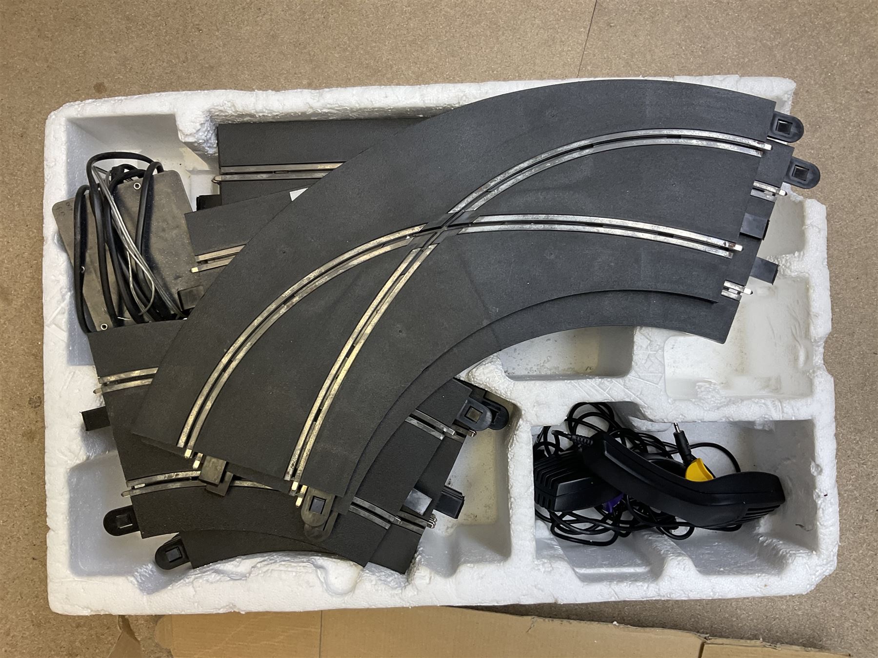 Scalextric - Porsche Power Set; boxed; Subaru Competition Rally Set (track and controllers only); boxed; Formula 1 Racing Car Set; polystyrene box base only; together with large quantity of track in four boxes; and quantity of accessories including vehicles, part vehicles for spares or repair, fencing, bridge, spare controllers etc