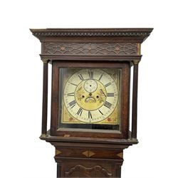 English - mid 19th century 8-day oak longcase clock, with a flat topped pediment and blind fret beneath, square hood door flanked by reeded pilasters with brass capitals, trunk with inlay and three-quarter reeded columns and a wavy topped door, plinth with a raised panel to the front, square fully painted dial, with a white chapter, Roman numerals and minute markers, seconds dial and calendar aperture, dial pinned via a false plate to a rack striking movement, striking the hours on a bell.
With weights, bell and pendulum bob.