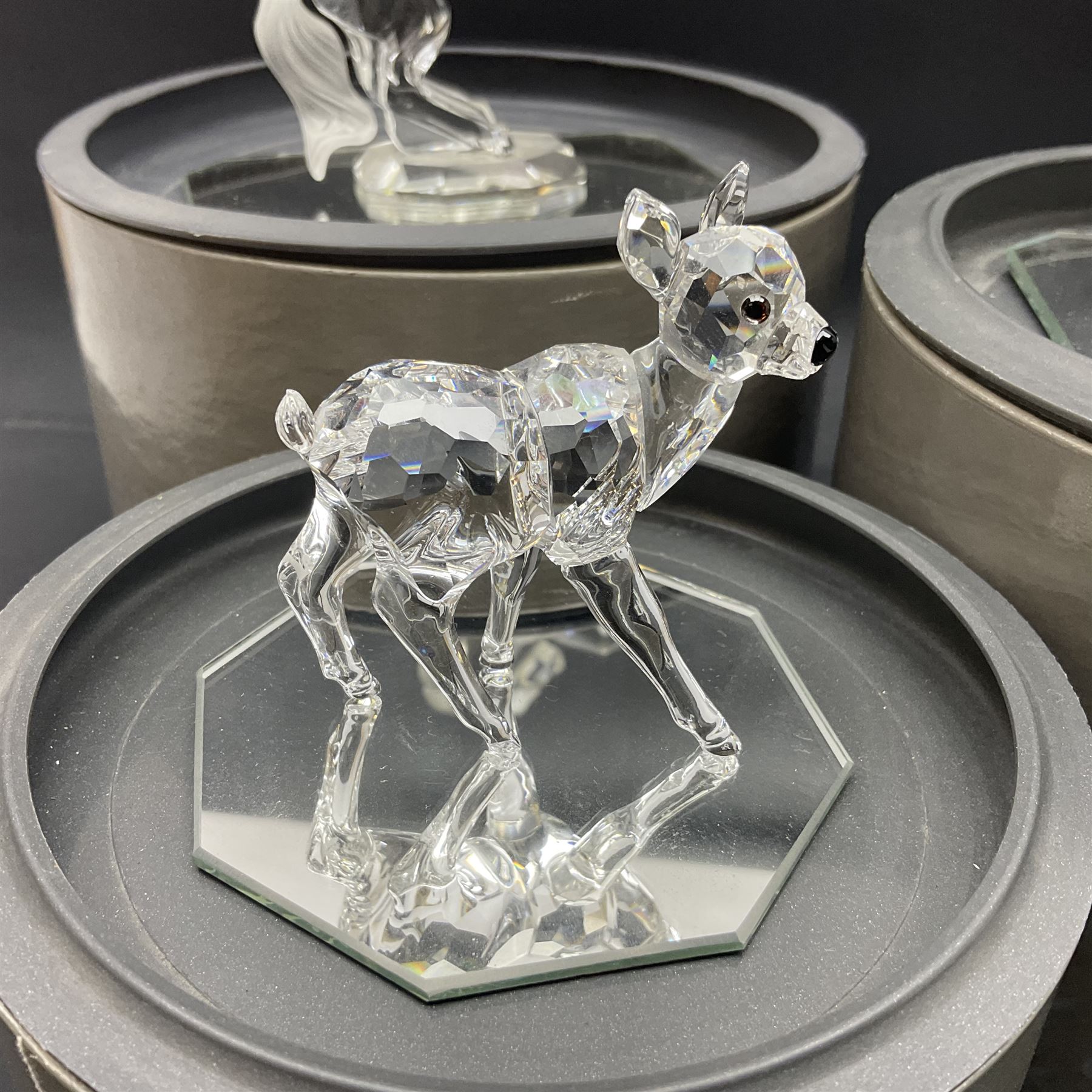 Five Swarovski Crystal figures, comprising giraffe, deer, hummingbird, rose and rearing horse, all with original boxes 