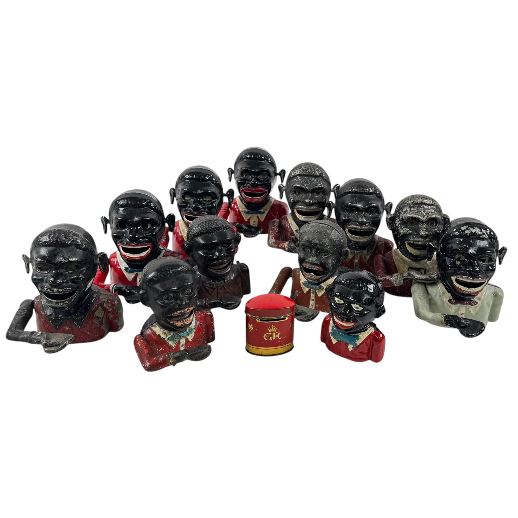Collection of cast iron Jolly money boxes 