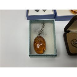 Silver Baltic amber jewellery, comprising two pendants, bracelet and pair of pendant earrings, together with pair of silver turquoise earrings, silver stone set pendant necklace and a gold plated bangle