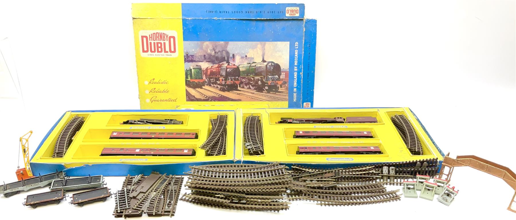 Hornby Dublo - two-rail 2022 'The Caledonian' Passenger Set LMR with Duchess Class 4-6-2 locomotive 'City of London' No.46245 with tender, two coaches and track, box base only, no lid; 4MT Standard 2-6-4 Tank locomotive No.80033 with two Talisman coaches and track in 2019 Goods Train Set box; four unboxed wagons, quantity of track, crane and buffer stops.