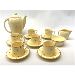  An Art Deco style Susie Cooper Polka pattern coffee set, produced for John Lewis, comprising coffee pot, six coffee cans, six saucers, a milk jug and sugar bowl, each with printed mark to base.   