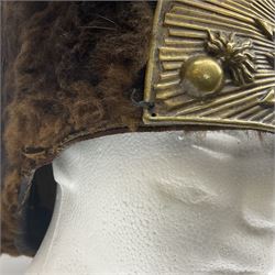 French Grenadier's bearskin hat, the embossed brass plate with crowned eagle, flaming grenades and arrow flashes; leather headband and traces of manuscript label internally