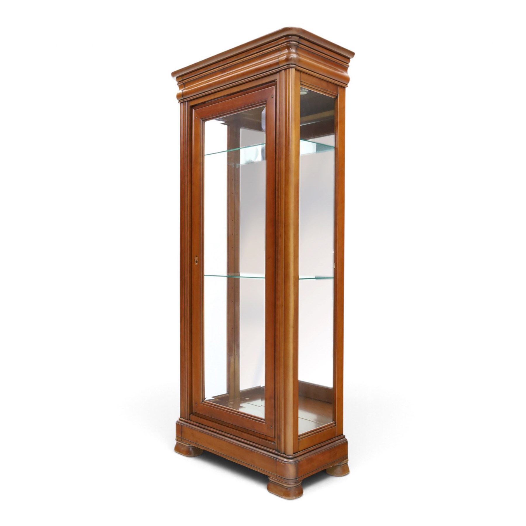 Barker & Stonehouse - cherrywood glazed cabinet, moulded projecting cornice glazed panels to the front and sides, mirrored back with adjustable glass shelves, moulded plinth base above short bun feet