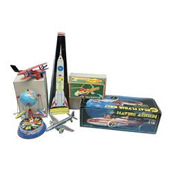 Six tinplate models of aircraft’s comprising Tucher & Walther aircraft in red, Lemezáru Gyár Space Rocket and Helicopter, MF-742 Great Flying Boat, further tinplate airplane and carousel with swinging airplanes; mostly boxed 