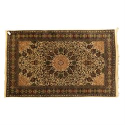 Persian Nain hand-knotted rug, central circular medallion with radiating floral scrolls an...