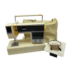 Singer Symphonie 300 sewing machine and accessories