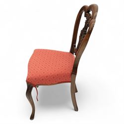 Set of four Victorian walnut balloon back chairs, with a carved and pierced back splat with foliate scrolls, serpentine seat upholstered in a diamond pattern fabric, raised on cabriole legs 