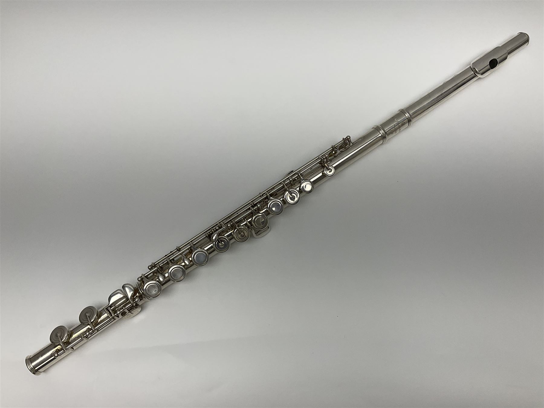 Rudall Carte & Co Ltd hallmarked silver three-piece flute; inscribed Rudall Carte & Co Ltd London No.51063; London 1986; in case marked Buffet Crampon Paris