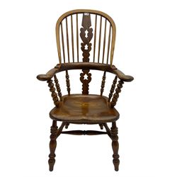 Traditional elm Yorkshire style Windsor armchair, high back with pierced and fret work splat, turned supports joined by double H stretcher